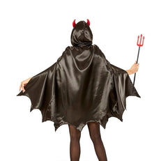 Person wearing a black devil costume with red horns and a trident on a white background