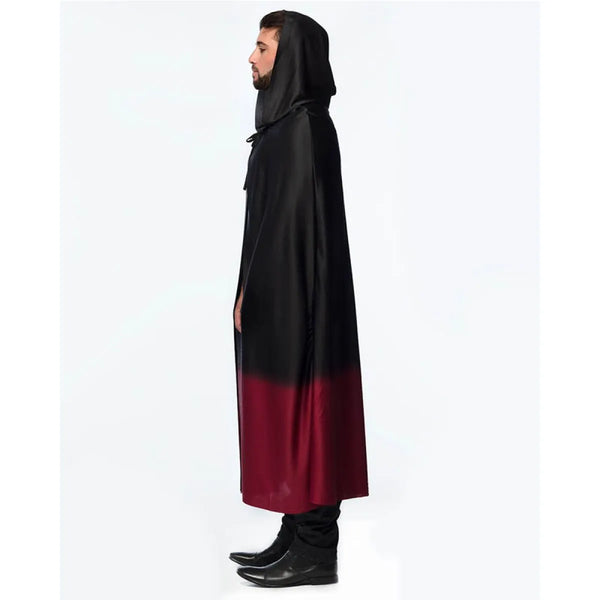 Person wearing a black and red hooded garment on a white background