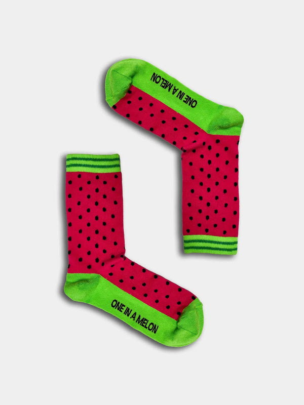 Water Melon themed socks with text that reads