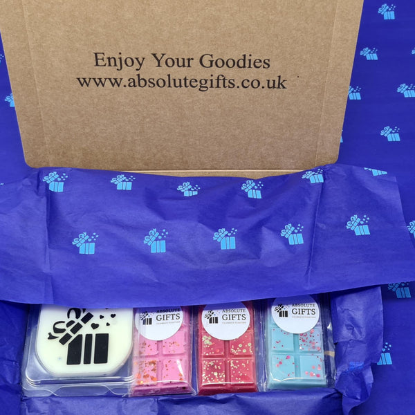 Luxurious Wax Melts Letterbox Gift Set - 1 Clamshell - 3 Snap Bars - 4 Shot Pots - 5 Tealights - Nestled In Blue Crepe Paper Folded To Reveal Text 