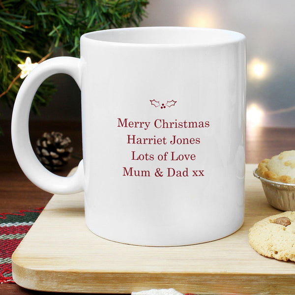 Personalised Merry Little Christmas Mug - Close Up Of The Rear Personalised Red Text Below Some Holly