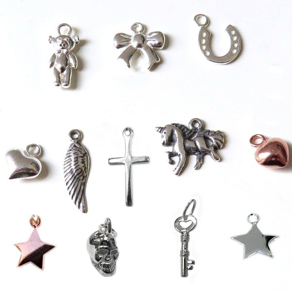 Charms include : hearts,teddy bear,stars,unicorn,cross,horseshoe,angel wing,bow,skull,key 