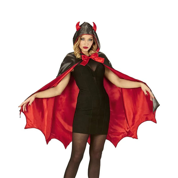 Person wearing a devil costume with a red cape and horns on a white background