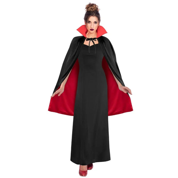 Woman wearing a black dress with a red cape on a white background