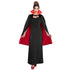 Woman wearing a black dress with a red cape on a white background