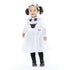 Child wearing a ghost costume with a white background