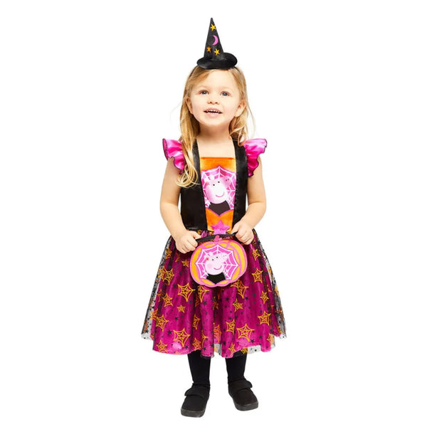 Child wearing a colorful Peppa Pig witch costume with a hat on a white background