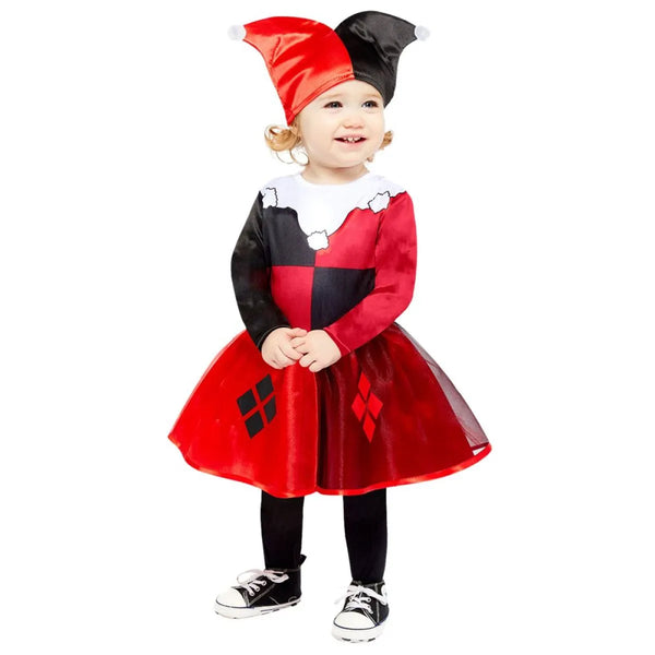 Child wearing a red and black Harley Quinn costume with a white collar on a white background