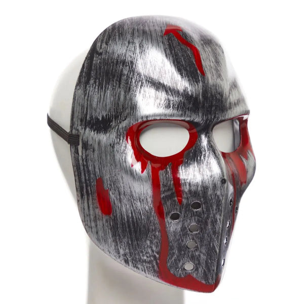 Mask with grey and red design on a white background