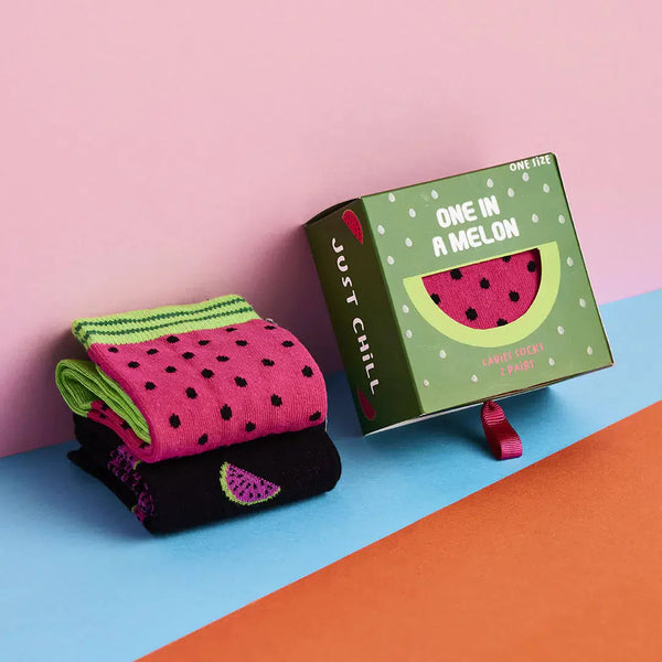 Boxed Water Melon socks with two pairs of socks next to it