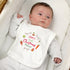 Baby Boy Wearing A Personalised 'First Christmas Dinner' Bib