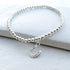 files/silver-beaded-charm-bracelet-722.jpg
