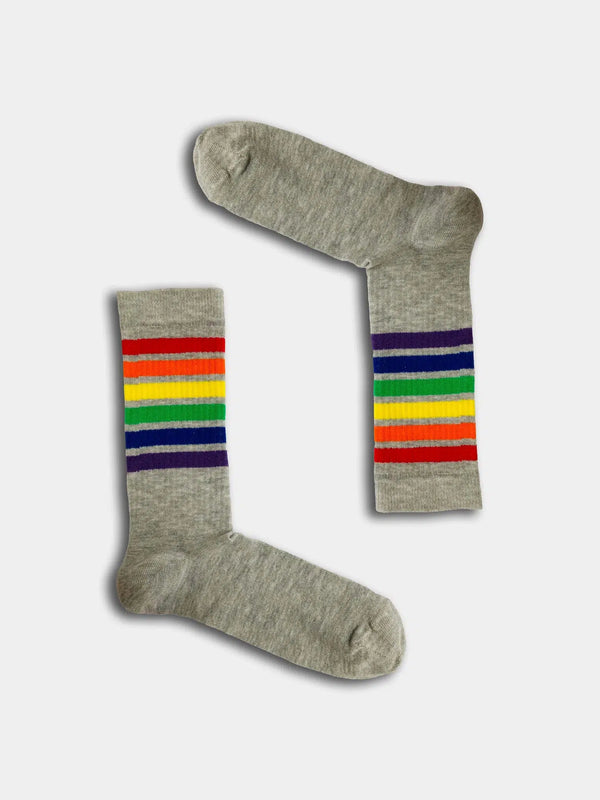 Grey socks with rainbow rings around the top of the sock