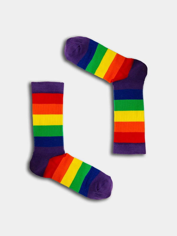 Blue sock with colourful rainbow lines