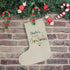 My First Christmas Stocking Hanging From The Fire Place - Charlie's Name Above Multi-Coloured First Christmas Text