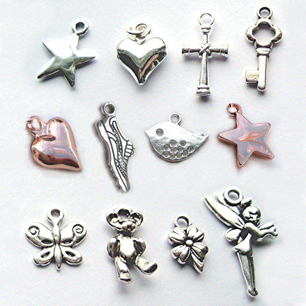 Charms: Silver Cross,Silver Bird,Silver Butterfly, Silver fairy, flower, Silver key, Silver puff heart, Rose Gold Puff Heart, Silver Running Shoe, Silver Star, Silver Teddy