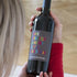 Personalised Merry Little Christmas Red Wine With Multi coloured Text That Reads "Have Yourself A Merry Little Christmas"
